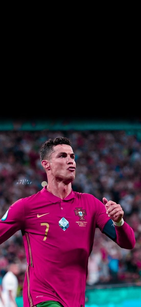 Messi Ronaldo Wallpaper While Shooting The Ball