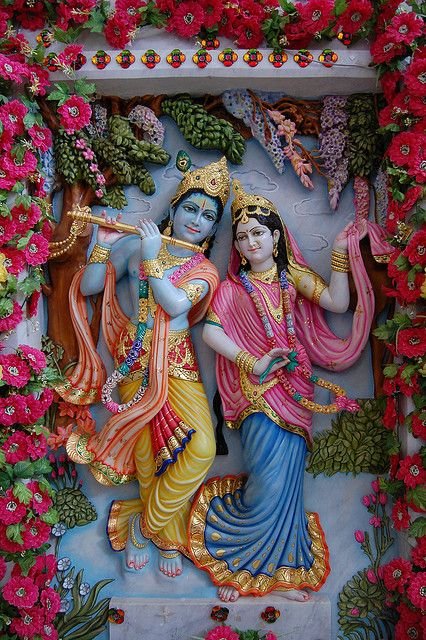 The Statue Of Radha Krishna On The Ground Images